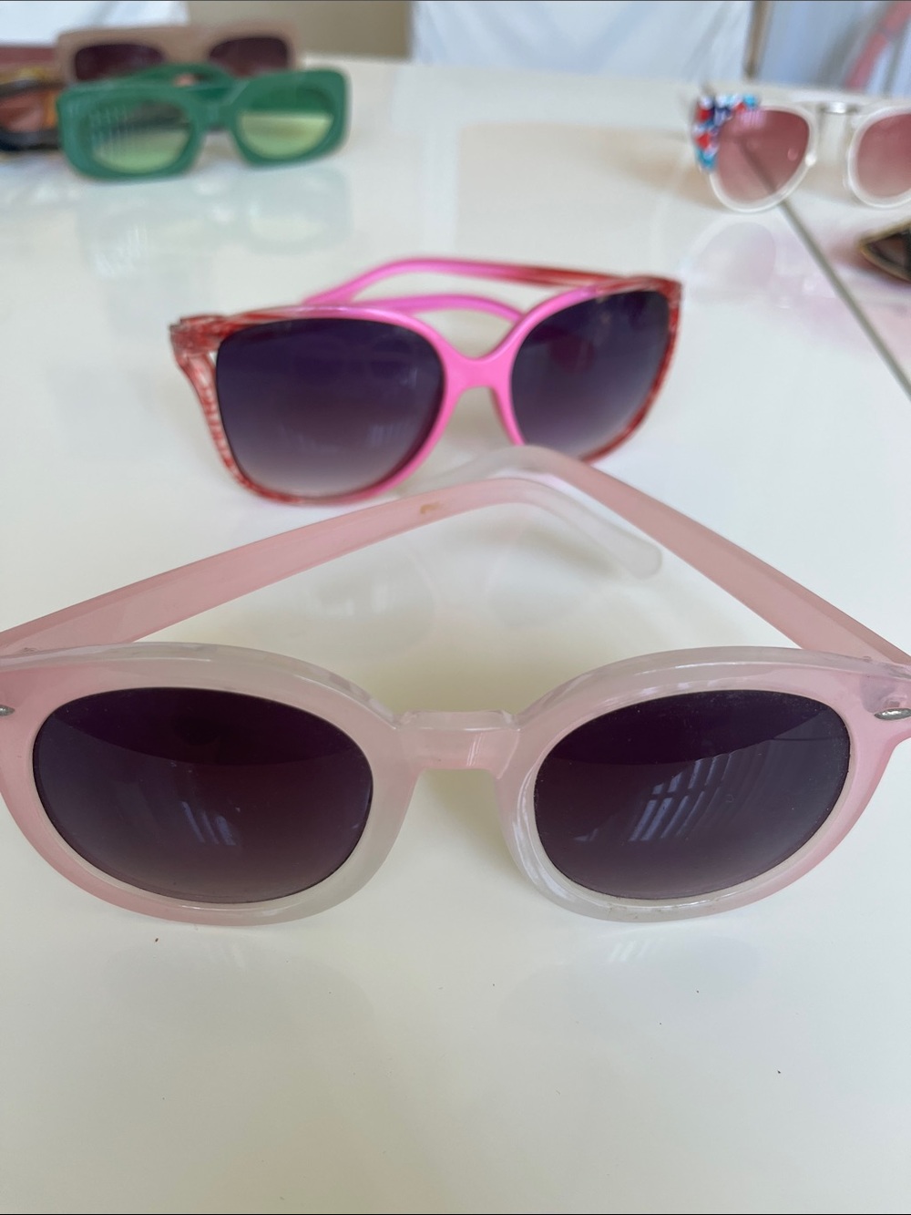 2 pairs of sunglasses